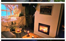 Black Walnut House With Indoor Outdoor Fireplace